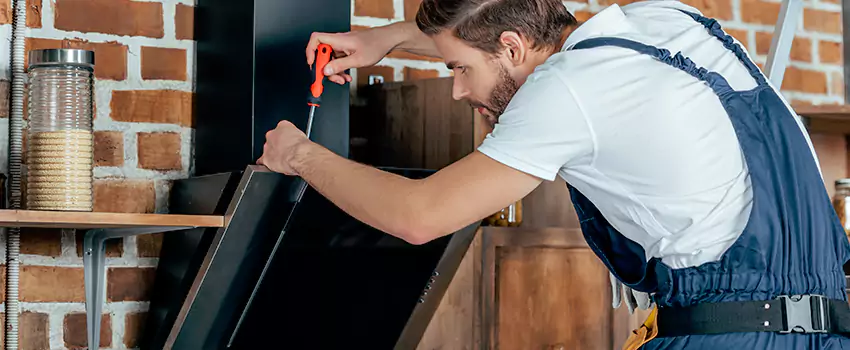Old Rusted Metal Fireplace Repair And Replacement in East Hill, BC